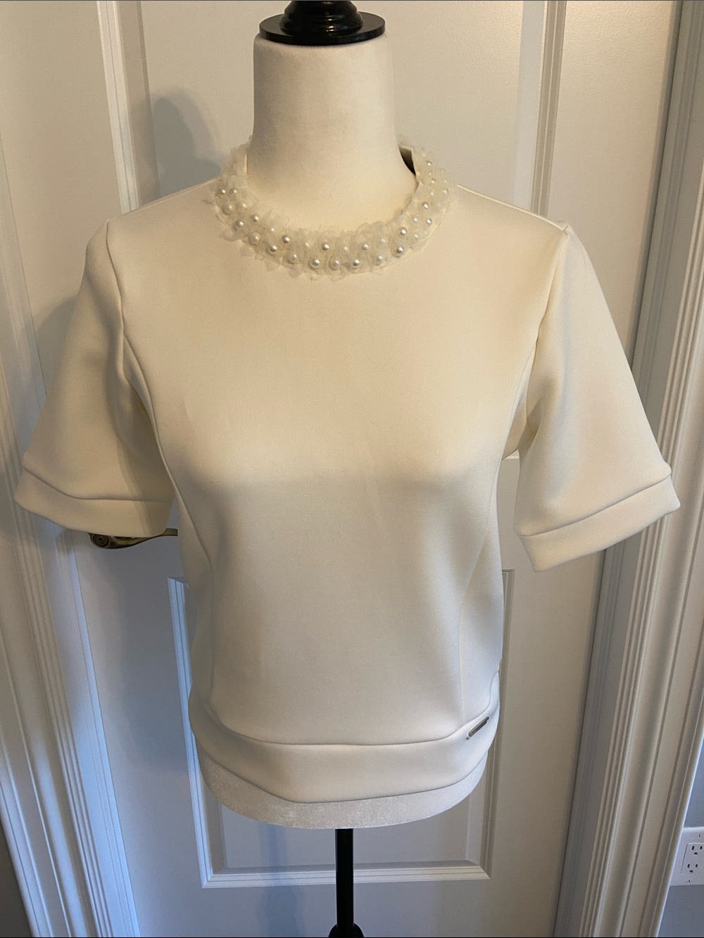 Pink Tartan Ivory/Cream Pearl and Ruffle Trim Short Sleeve Top. Size small.